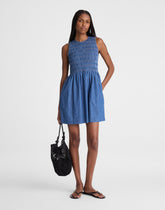 The Denim Melody Smocked Mini Dress